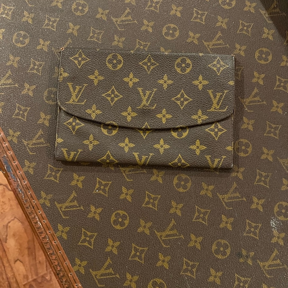 Louis Vuitton Monogram Clutch Wallet. Long style.